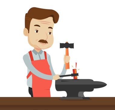 Demirci çalışma metal örs çekiç ile.