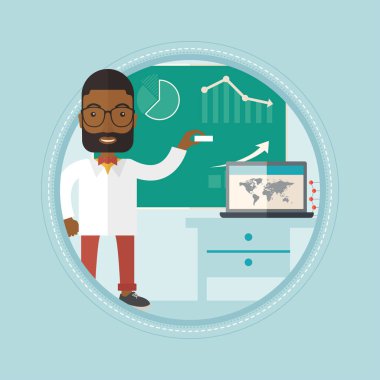 Öğretmen tahtaya tebeşir ile çizim.