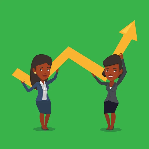 Dos mujeres de negocios sosteniendo gráfico de crecimiento . — Vector de stock