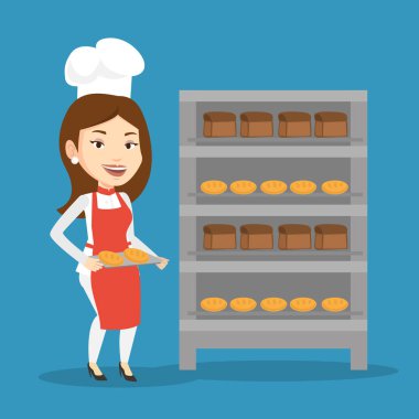Mutlu genç kadın baker ekmek tepsi tutarak.