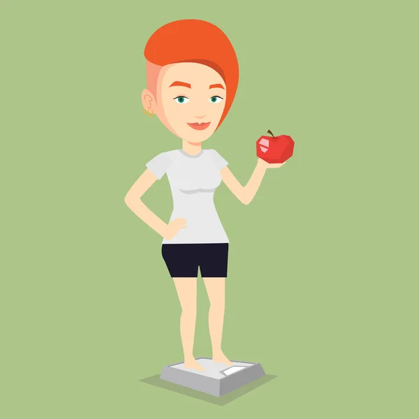 Wanita berdiri pada skala dan memegang apel di tangan . - Stok Vektor