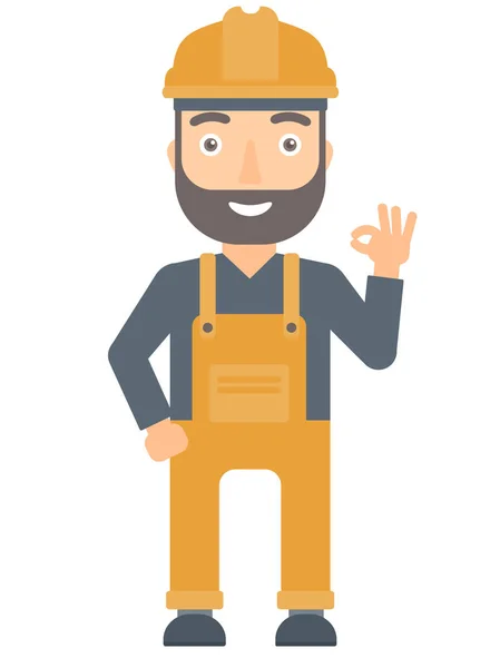 Smiling builder showing ok sign. — Stock Vector