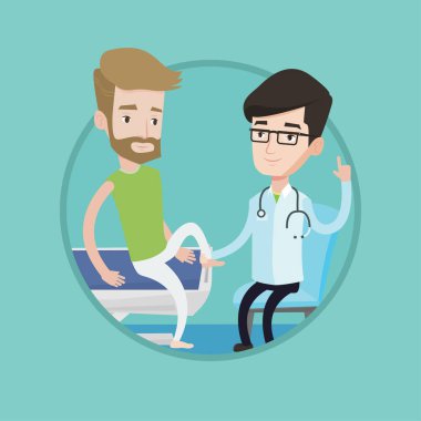Spor salonu Doktor hastanın ayak bileği kontrol.