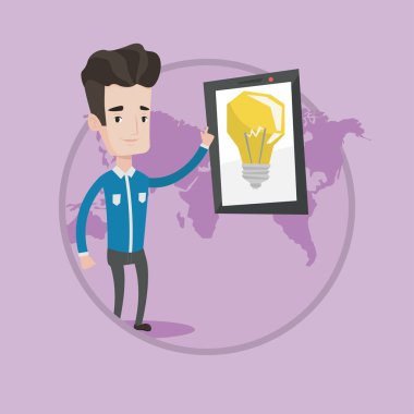 Büyük tablet bilgisayarda işaret eden adam.