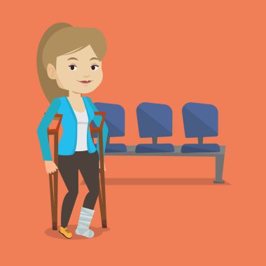 Kırık bacak ve koltuk değneği olan adam.