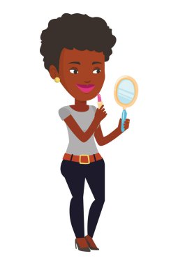 Woman holding  red color lipstick.