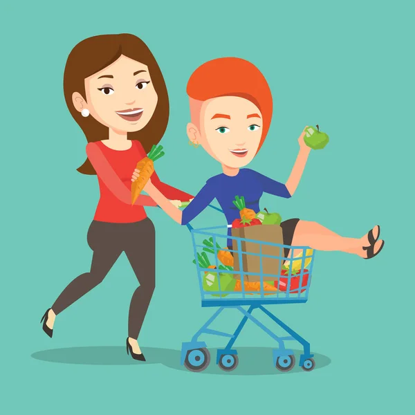 Un par de amigos montando en el carrito de la compra . — Vector de stock