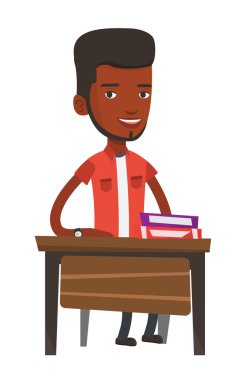 Afrikalı-Amerikalı öğrenci masada oturan.
