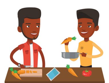 Erkekler sağlıklı sebze yemek pişirme.