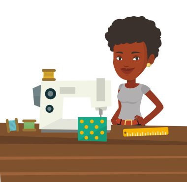 Terzi Atölyesi'nde dikiş makinesi kullanma.