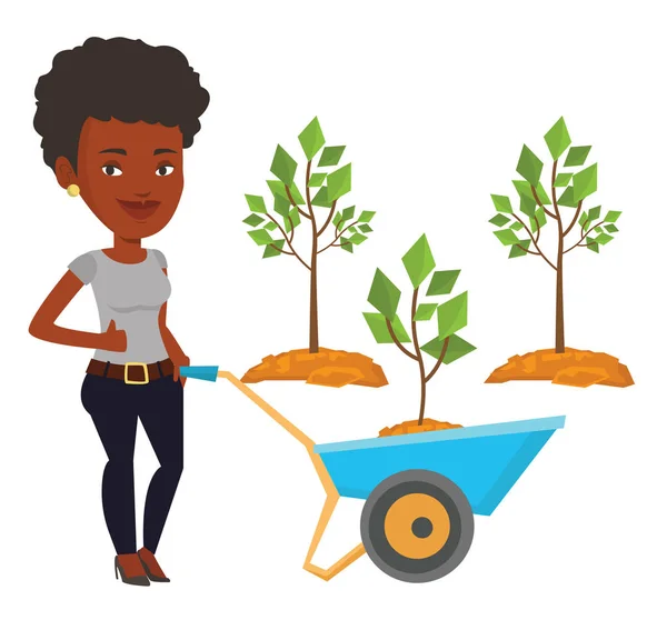 Mujer empujando carretilla con planta . — Vector de stock