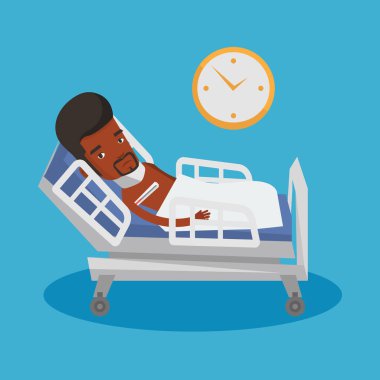 Hasta adam yatakta döşeme termometre ile.