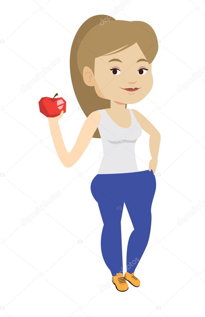 Slim woman in pants showing results of her diet.