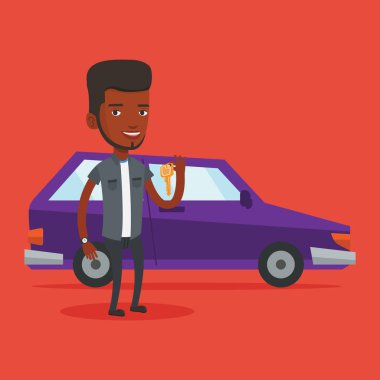 Yeni arabasının anahtarları tutan adam.