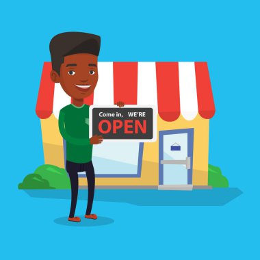 Dükkan sahibi açık tabela holding.