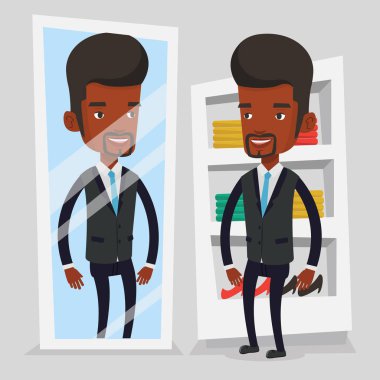 Soyunma odasında giysilerindeki çalışan adam.