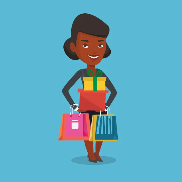 Mujer feliz sosteniendo bolsas de compras y cajas de regalo . — Vector de stock