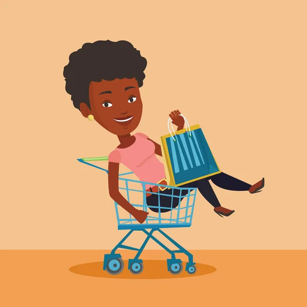 Mujer feliz montando por carrito de compras . — Vector de stock