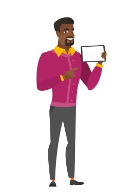 Smiling businessman holding tablet computer.