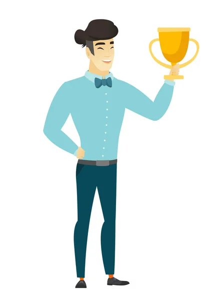 Hombre de negocios asiático sosteniendo un trofeo . — Vector de stock