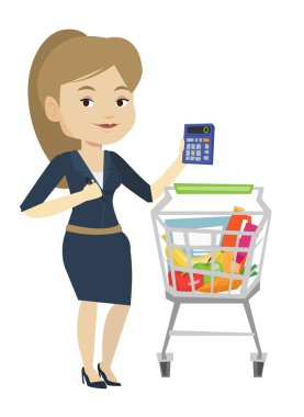 Kadın Müşteri Hesap makinesinde sayma.