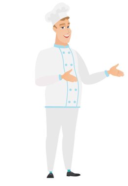 El hareketi genç beyaz mutlu şef aşçı.