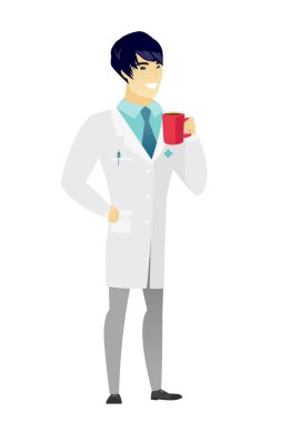 Kahve tutan genç Asyalı doktor.