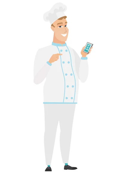 Chef cuisinier caucasien tenant un téléphone mobile . — Image vectorielle