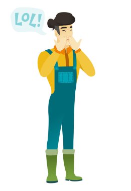 Kahkahalarla gülmekten genç Asyalı çiftçi.