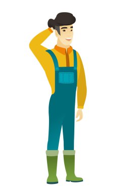 Elini başının arkasında tutarak Asya çiftçi.