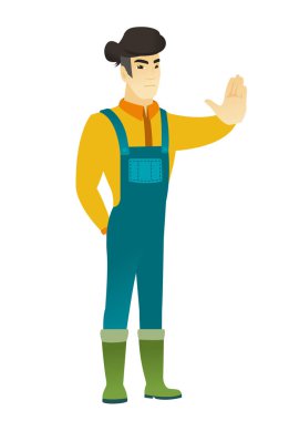 Stop el hareketi gösteren Asyalı çiftçi.