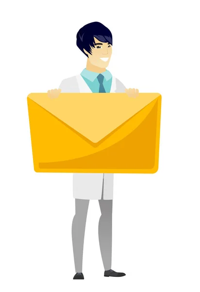 Smiling doctor holding a big envelope. — Stock Vector
