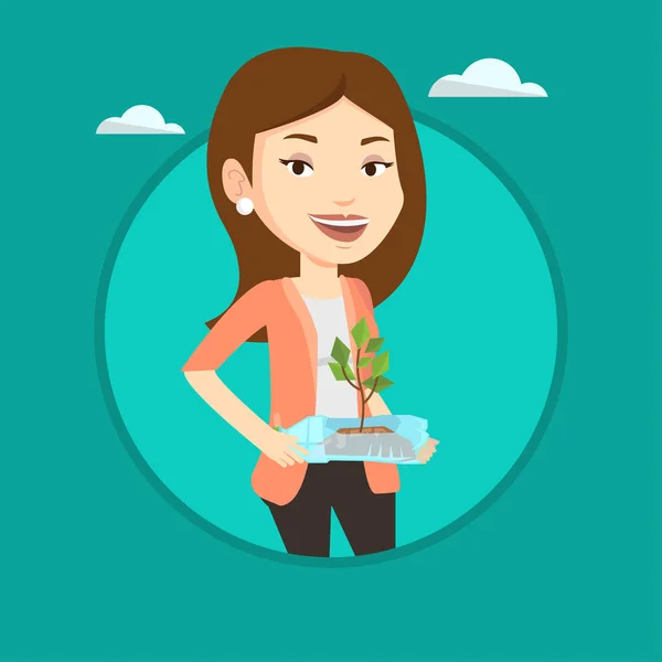 Mujer sosteniendo planta creciendo en botella de plástico . — Vector de stock