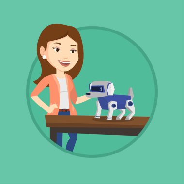 Robot köpekle oynamayı mutlu genç kadın.