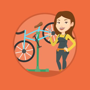 Tamir dükkanında çalışan Beyaz Bisiklet tamircisi.