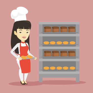 Mutlu genç kadın baker ekmek tepsi tutarak.