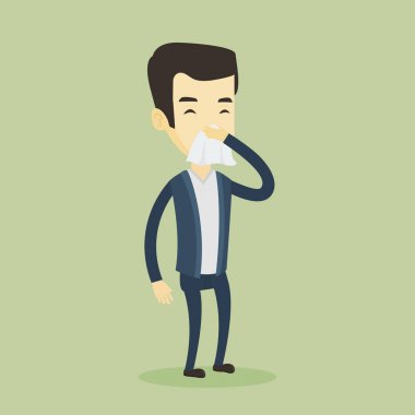 Genç Asyalı hasta adam hapşırma.