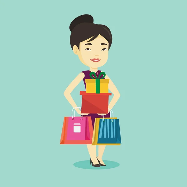 Mujer feliz sosteniendo bolsas de compras y cajas de regalo . — Vector de stock