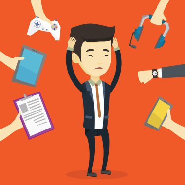 Genç adam onun gadget'lar ile çevrili.