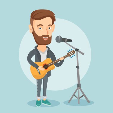 Adam mikrofon şarkı ve gitar çalmak.