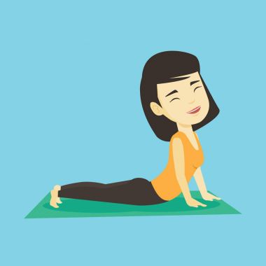 Kadın pratik yoga yukarı doğru köpek poz.