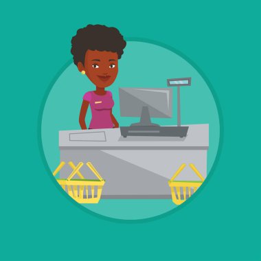 Süpermarkette kasada duran kasiyer.