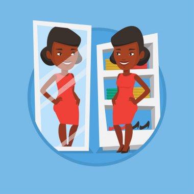 Kadın kıyafetleri soyunma odasında üzerinde çalışıyor.