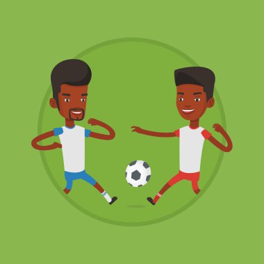 İki erkek futbol oyuncuları top için mücadele.