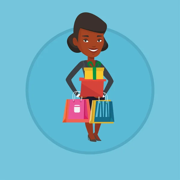 Mujer feliz sosteniendo bolsas de compras y cajas de regalo . — Vector de stock