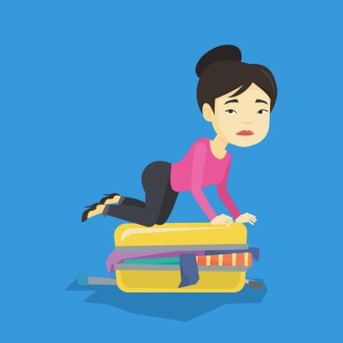 Genç kadın çanta kapatmak çalışıyor.