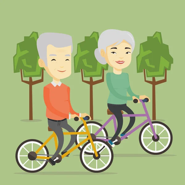 Senior couple riding on bicycles in the park — Stock Vector