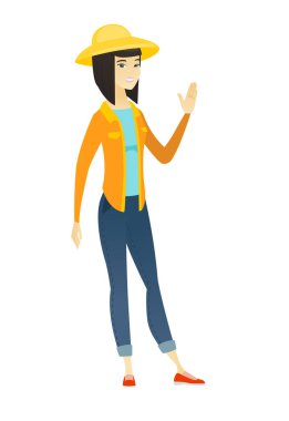 Elini sallayarak genç Asyalı çiftçi.