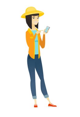 Asyalı çiftçi bir cep telefonu tutan.