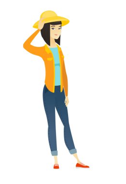 Genç Asyalı çiftçi başını tırmalamak.